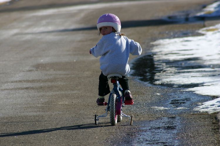 Teaching a child to ride a bike requires that the child's fears are removed.